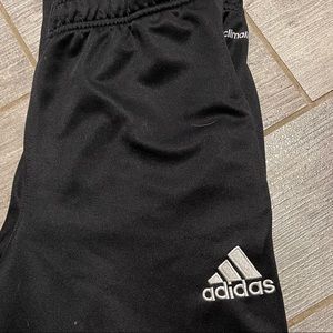 Medium black adidas’s sweats with zipper on the side calf